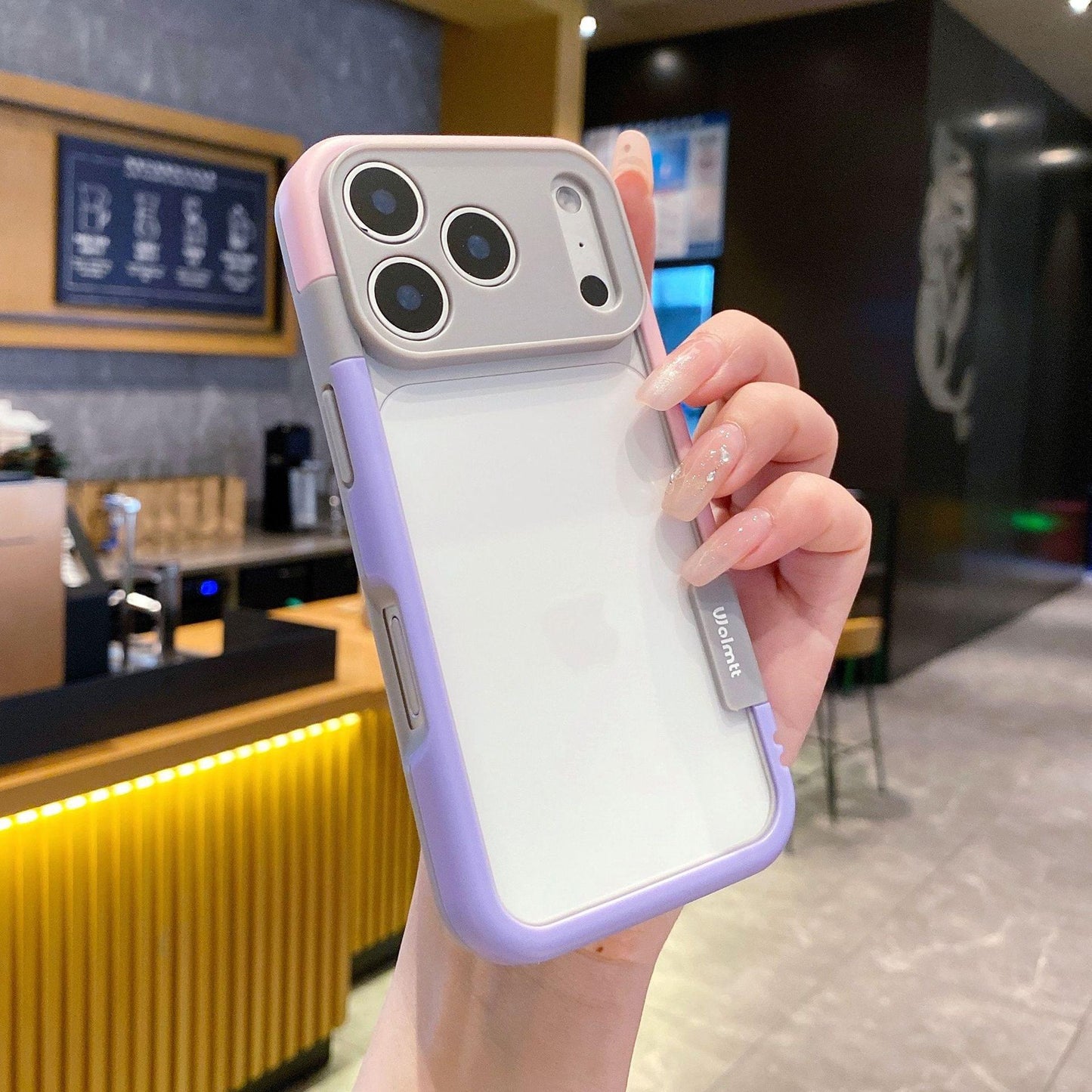 Phone case featuring a white back with lavender edging and camera cutouts