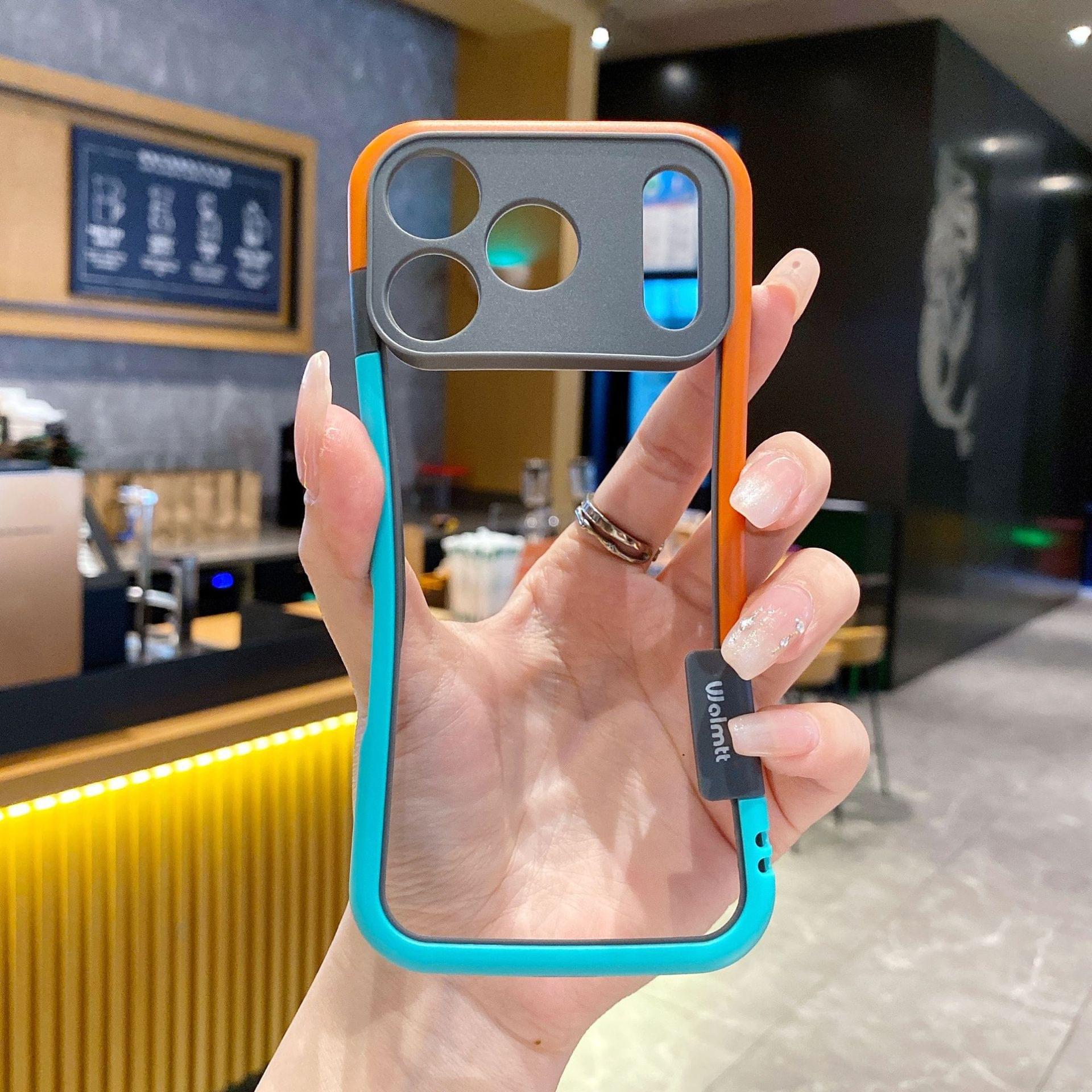 Dual-color border phone case with blue edges and clear back, camera cutouts.
