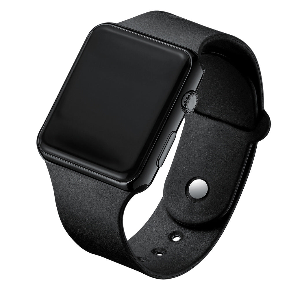 Digital electronic wristwatch with black screen, black case, black silicone strap, silver button.