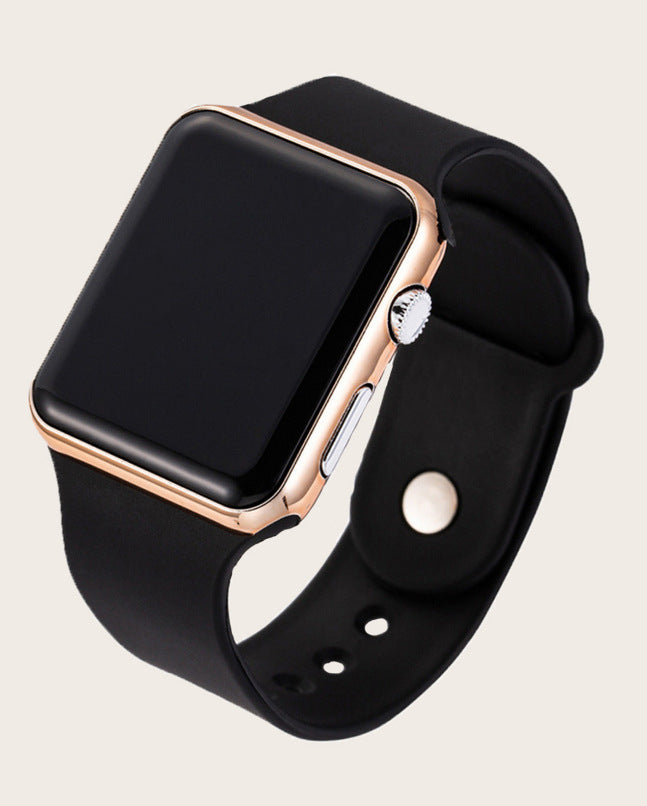 Digital electronic wristwatch with black screen, rose-gold case, black silicone strap.