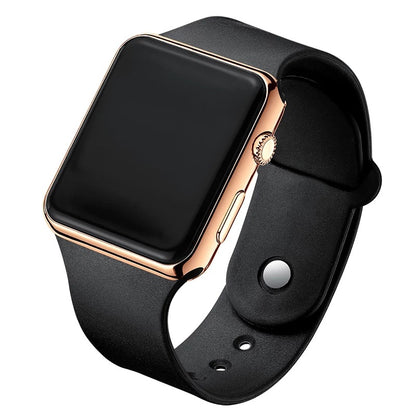 Digital electronic wristwatch with black screen, rose-gold case, black silicone strap.
