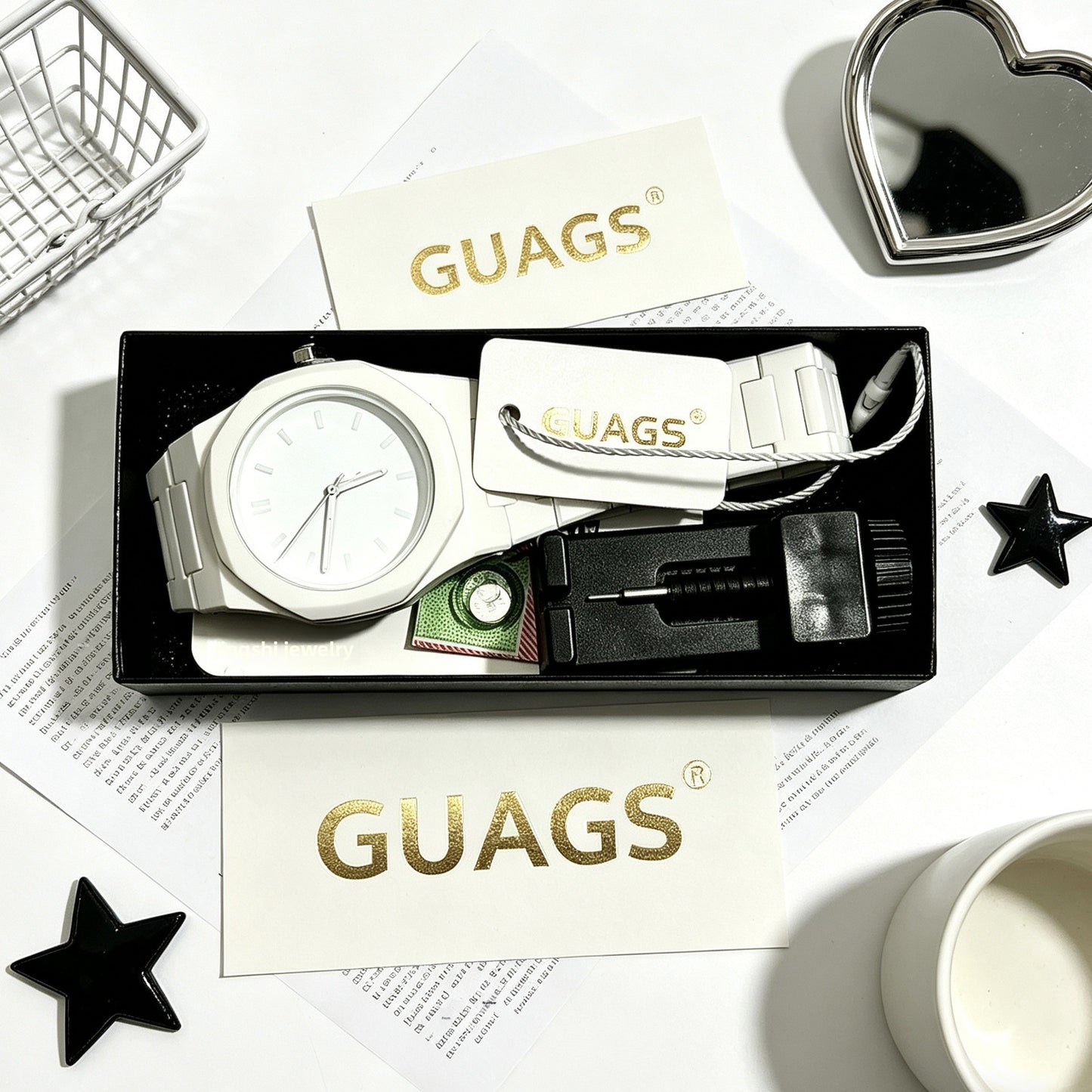 Quartz wristwatch set with white dial, silver metal bracelet and black strap