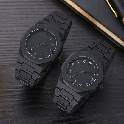 Two black quartz wristwatches with round dials and black metal link straps