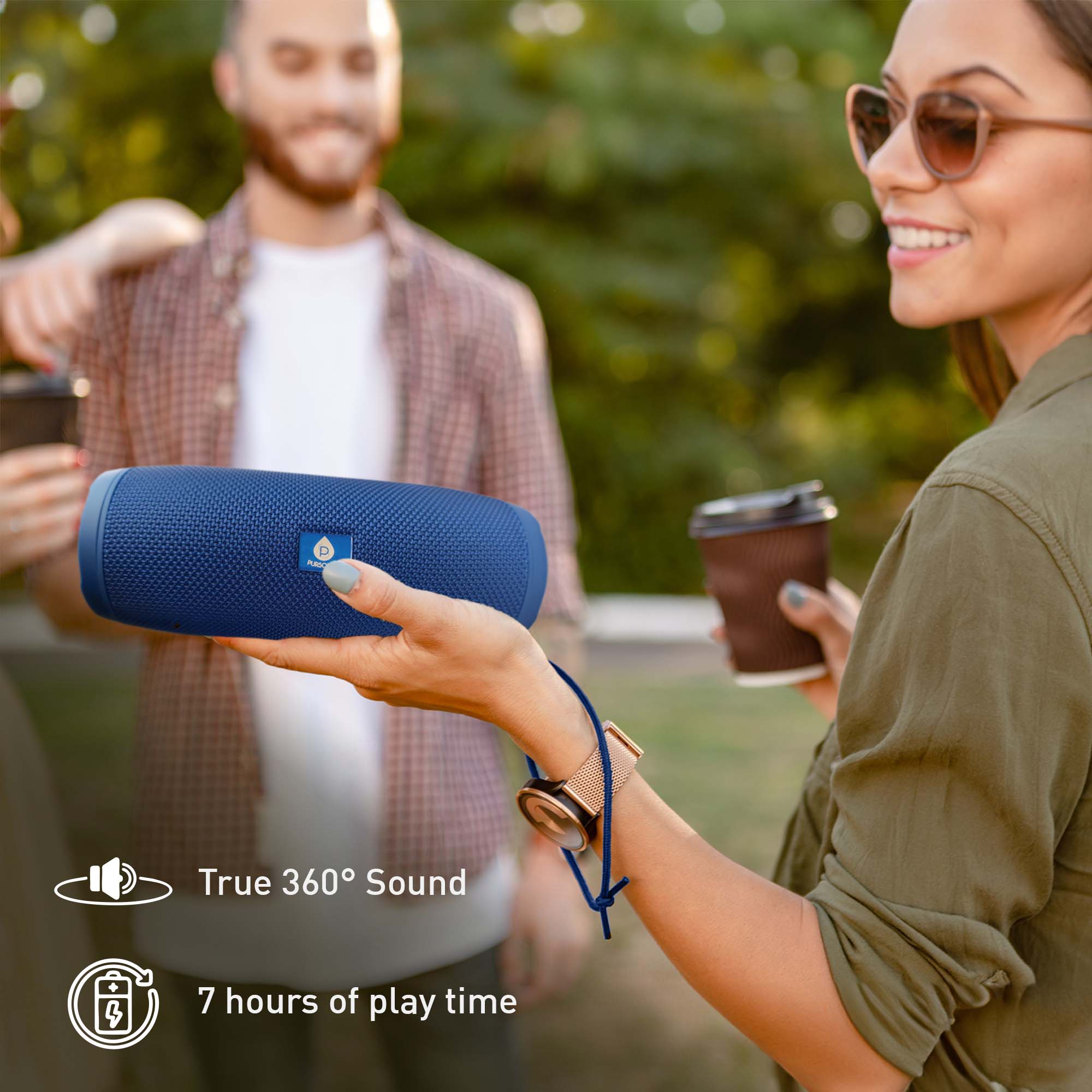 Blue portable Bluetooth speaker with textured fabric, logo, and wrist strap