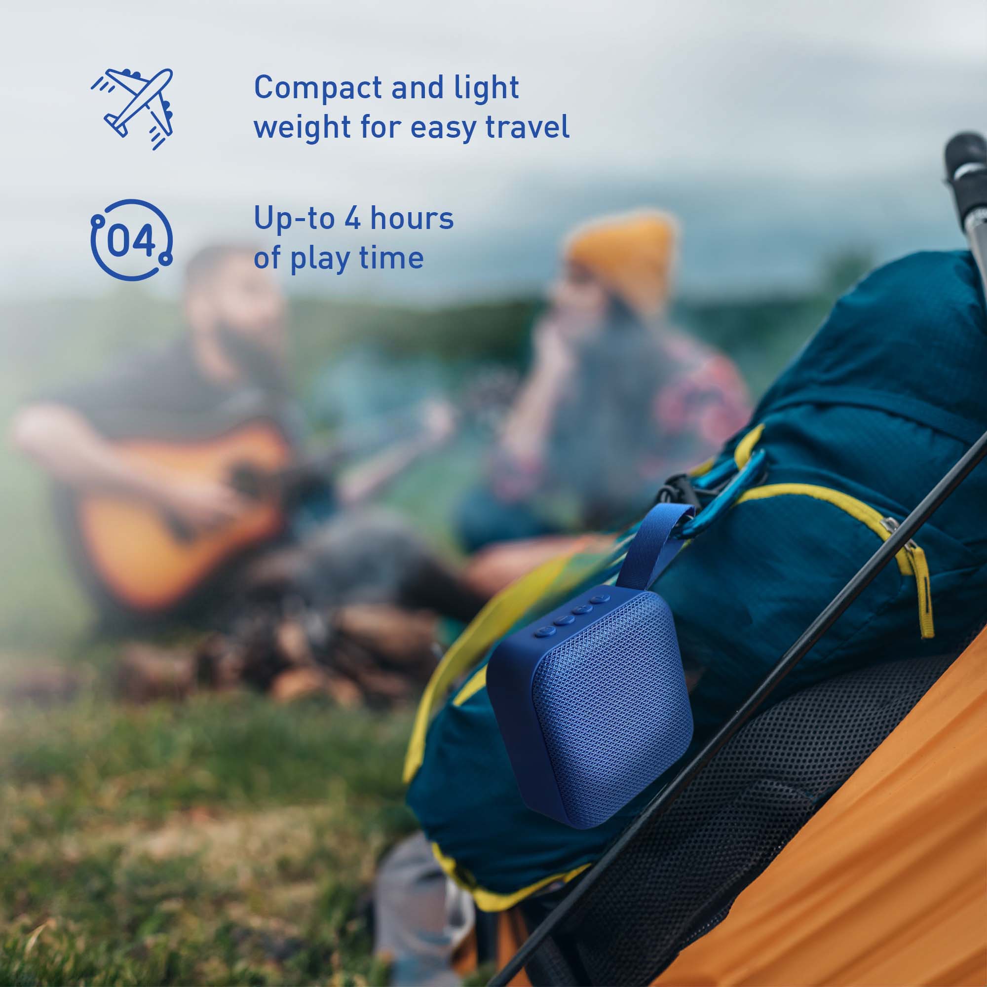 Blue portable wireless speaker with fabric texture and carry strap