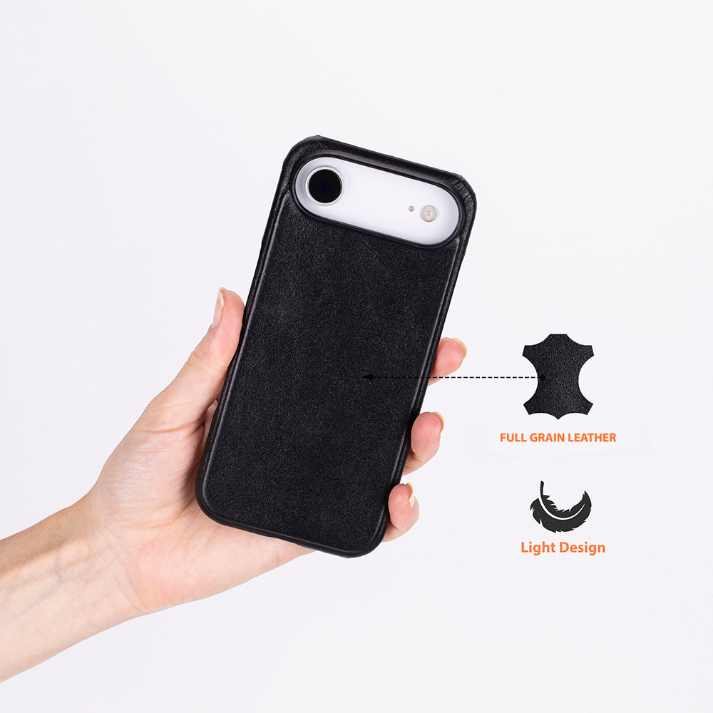 Black leather iPhone case held in hand, camera cutout and smooth textured finish.