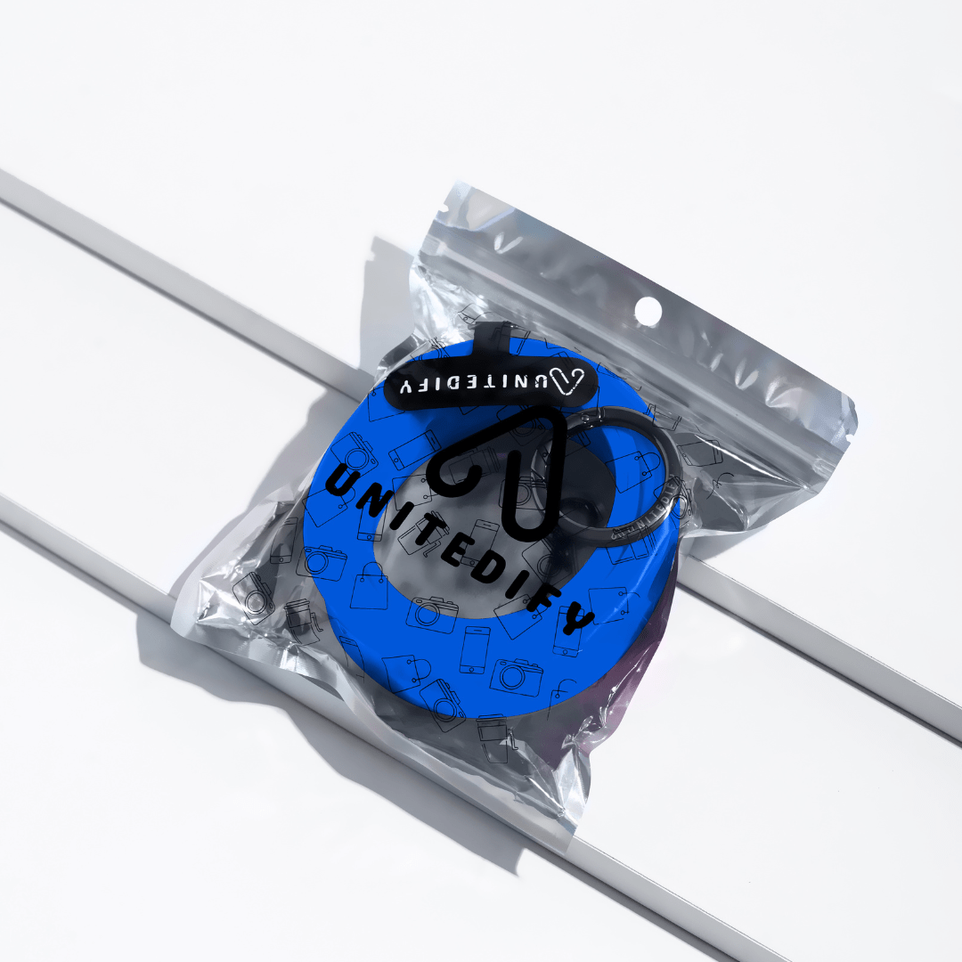 Phone strap with blue patterned loops, shown in a sealed polybag by Unitedify