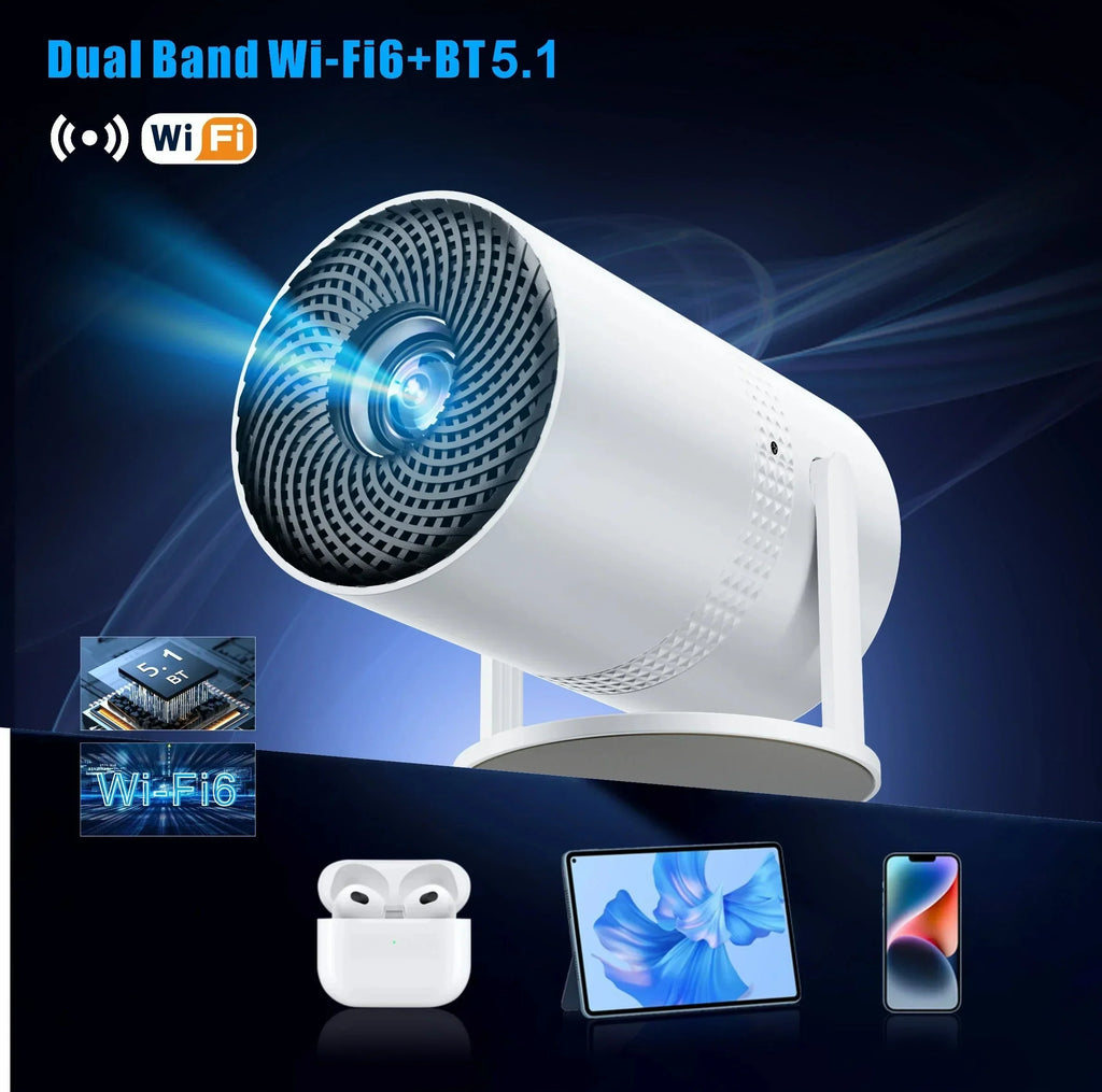 White mini projector with front lens grille, shown with earbuds and devices