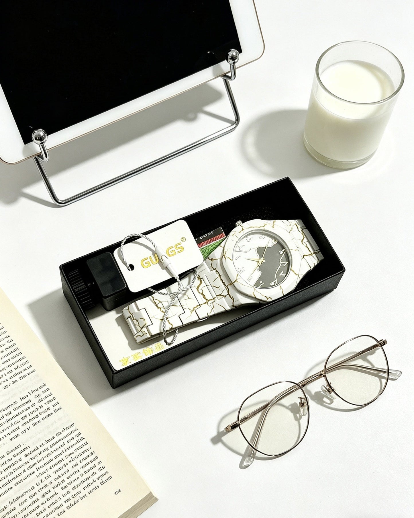 Quartz wristwatch set in open box with white dial watch
