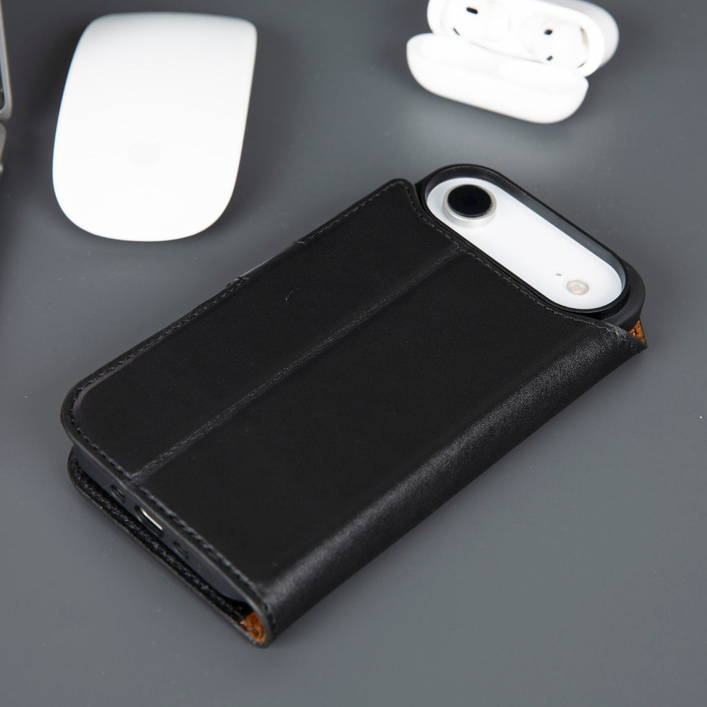 Black leather iPhone wallet case with phone back showing through cover