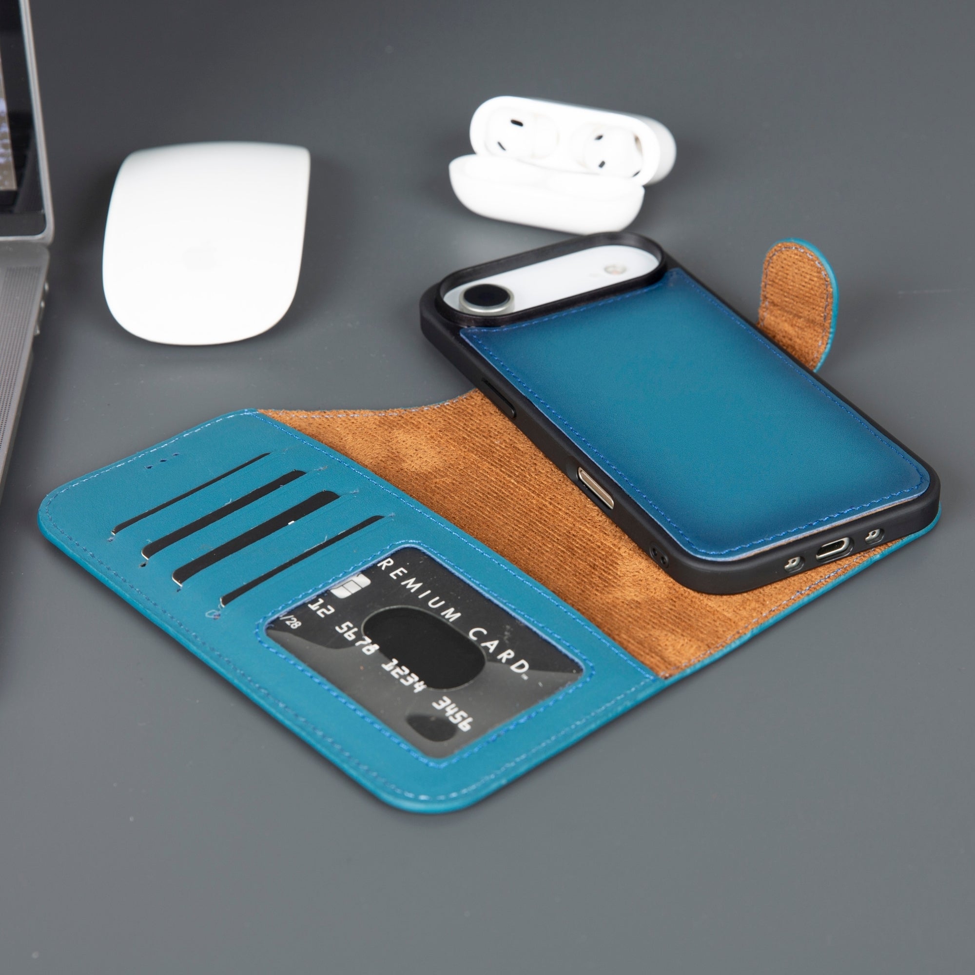 Leather iPhone wallet case in blue with tan card slot panel and phone back