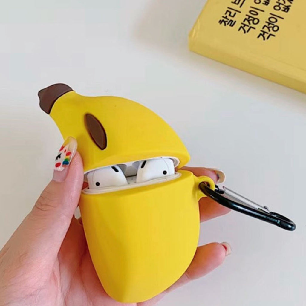 Banana-shaped AirPod case in bright yellow with brown top and oval speaker opening