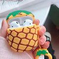 Pineapple AirPod case with green leaf top and honeycomb pattern.