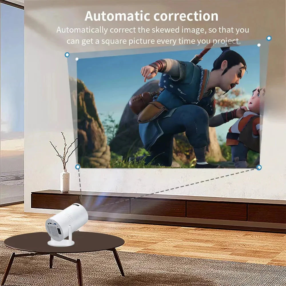 White mini portable projector on a table projecting an image