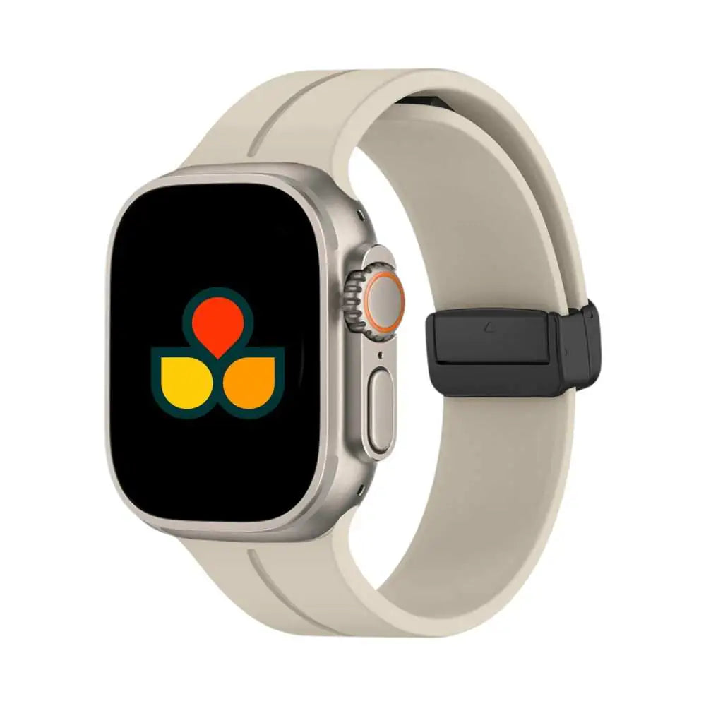 Light gray silicone smartwatch strap with black buckle and fastening holes