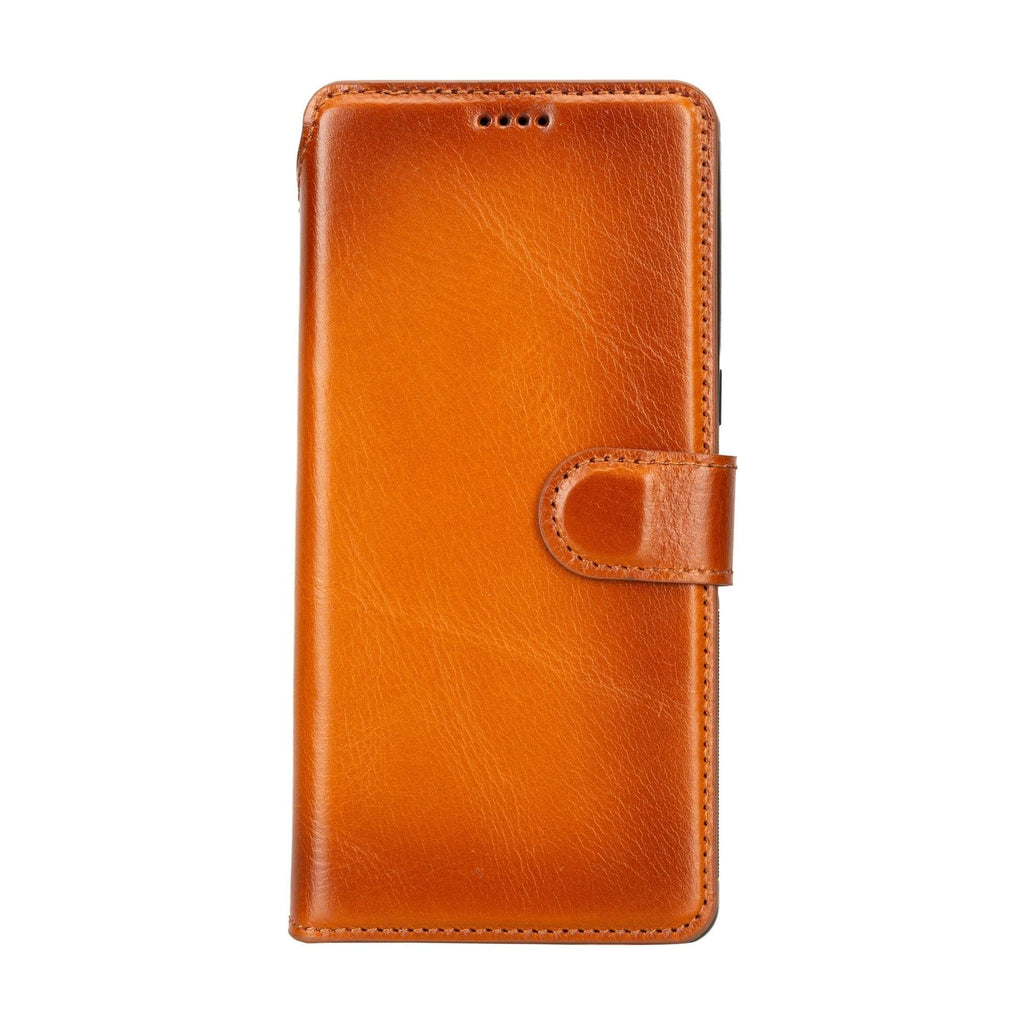 Tan leather flip wallet with rounded button tab closure